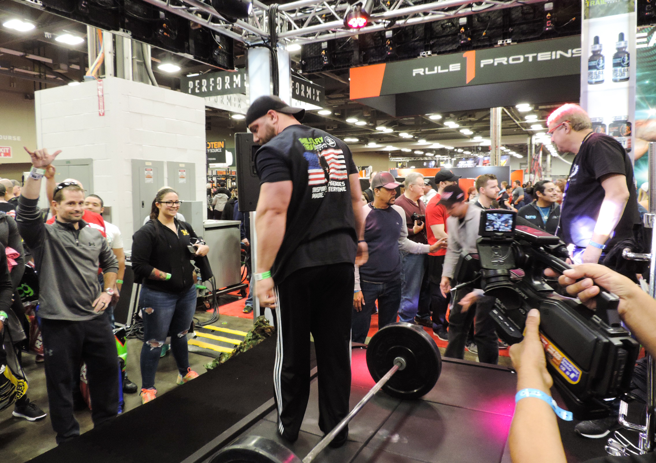 Weight lifting challenge at the Midway Labs booth.