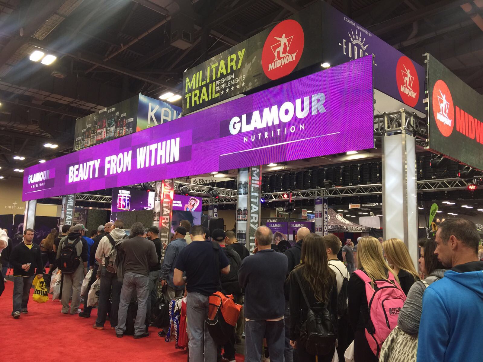 People lining up outside Glamour Nutrition Booth to check<br /> out the products and giveaways.