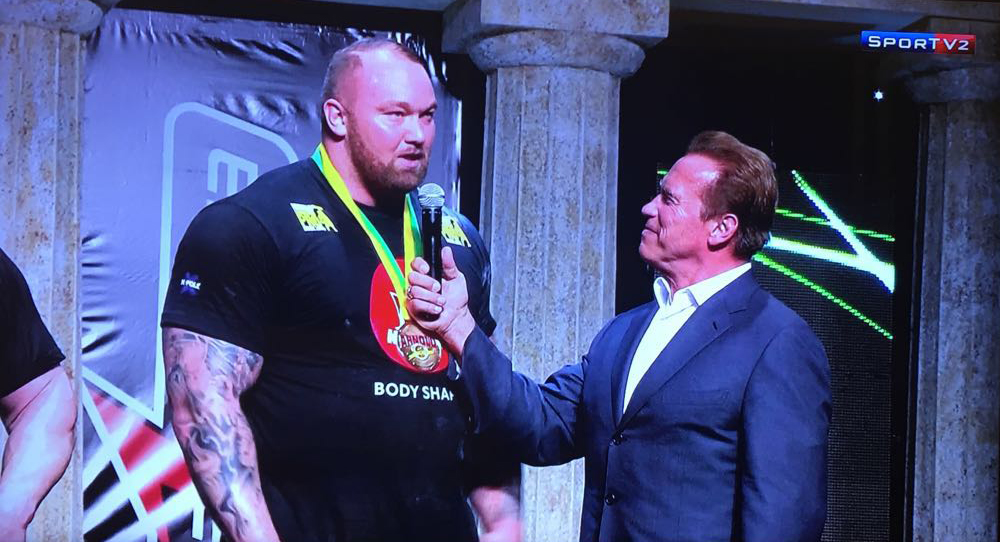 Arnold Schwarzenegger with Hafþór Júlíus Björnsson at Strongman Pro Competition - Midwaylabs