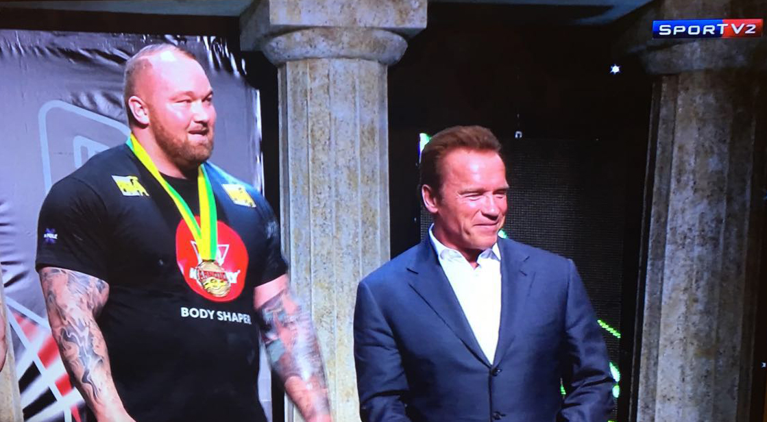 Arnold Schwarzenegger with Hafþór Júlíus Björnsson at Strongman Pro Competition - Midwaylabs